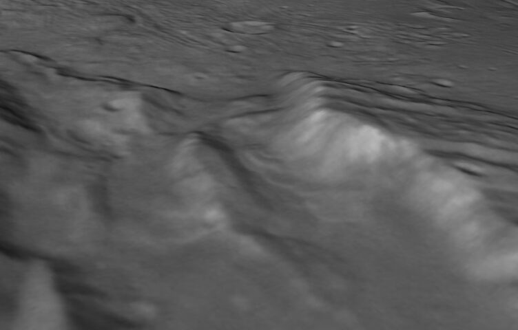 Landslides in a Charon Chasm